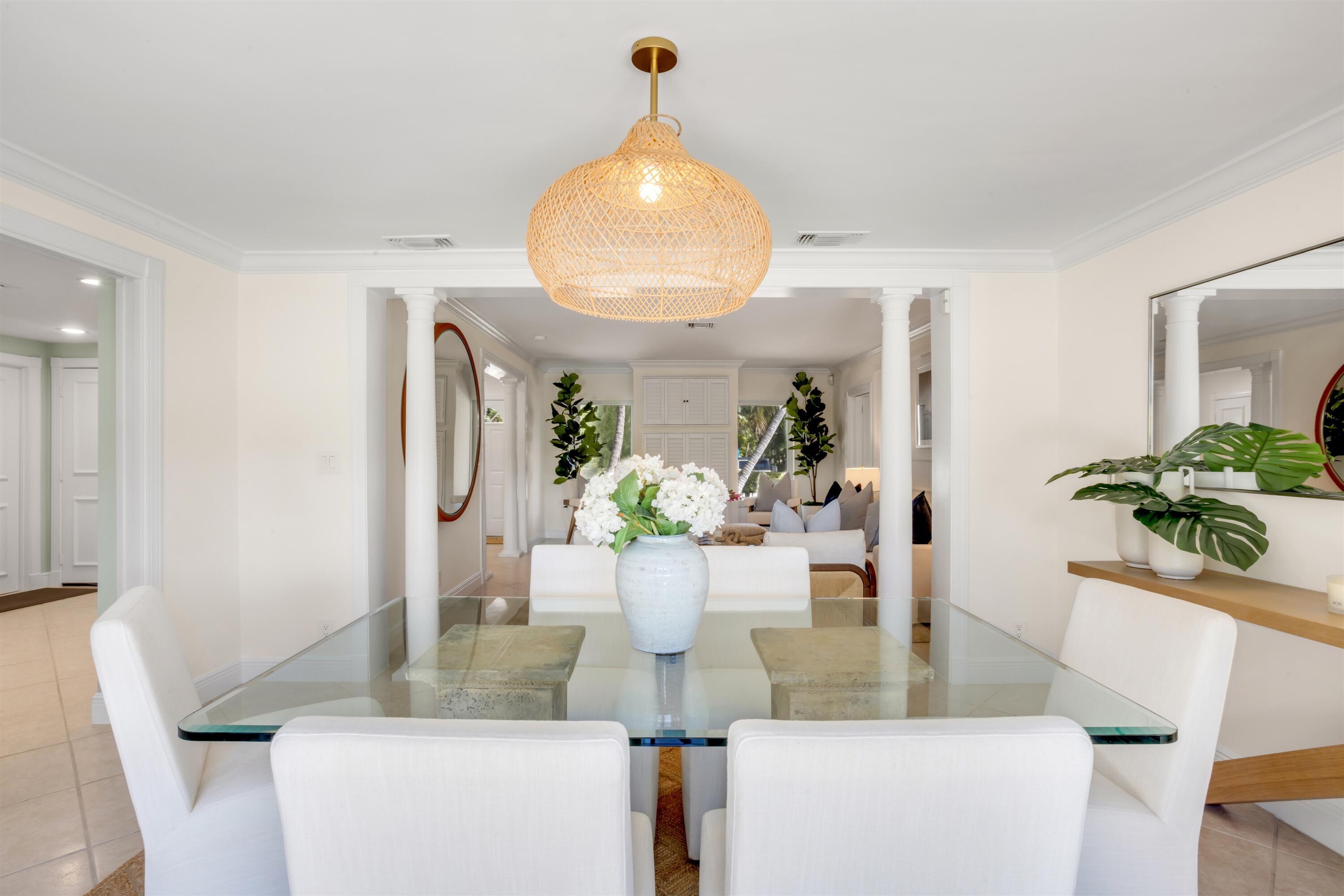 481 Northwest 5th Avenue Boca Raton, FL 33432 - Photo 12 of 28 a view of dining room with a table and chairs