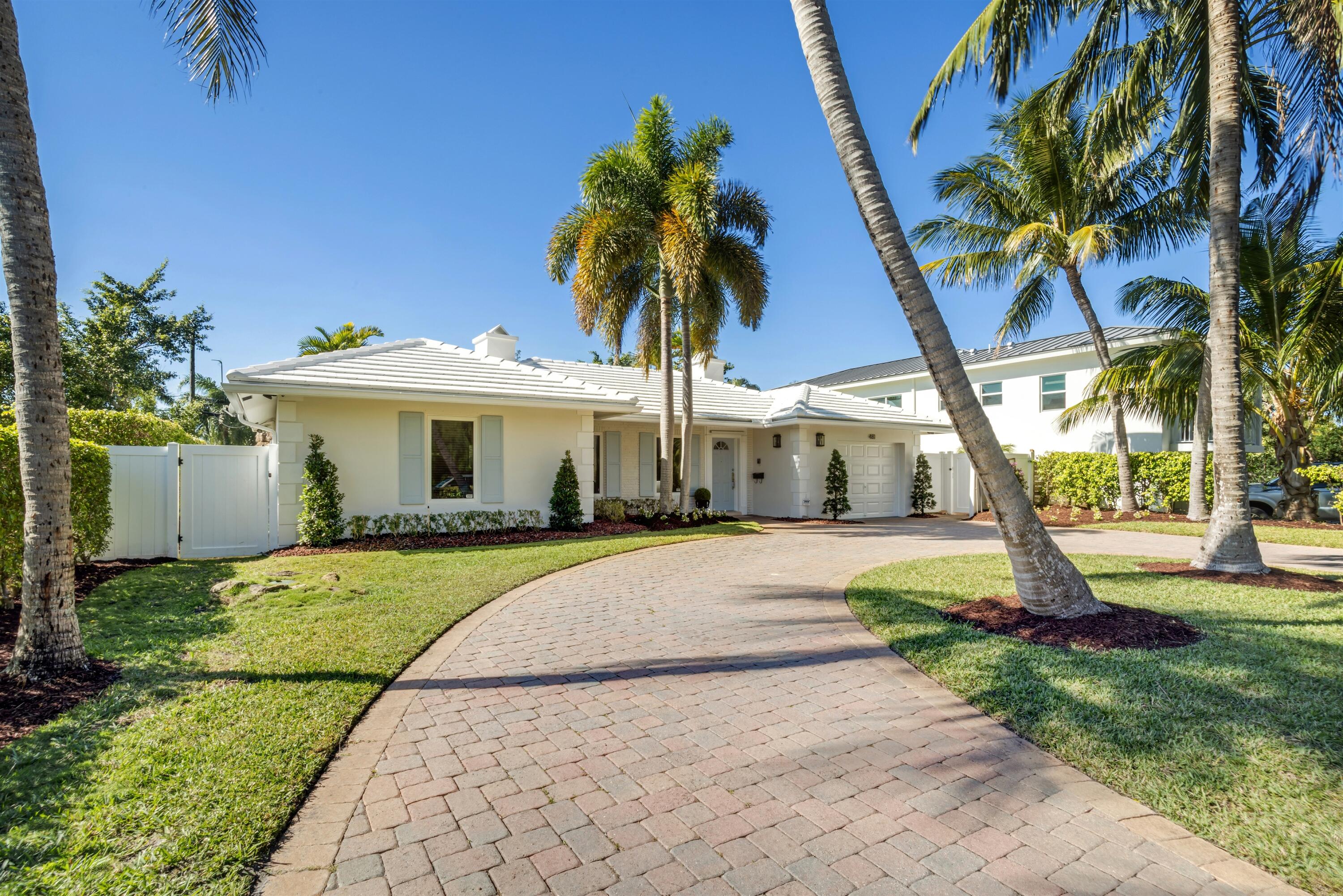 481 Northwest 5th Avenue Boca Raton, FL 33432 - Photo 2 of 28 a front view of house with yard and green space