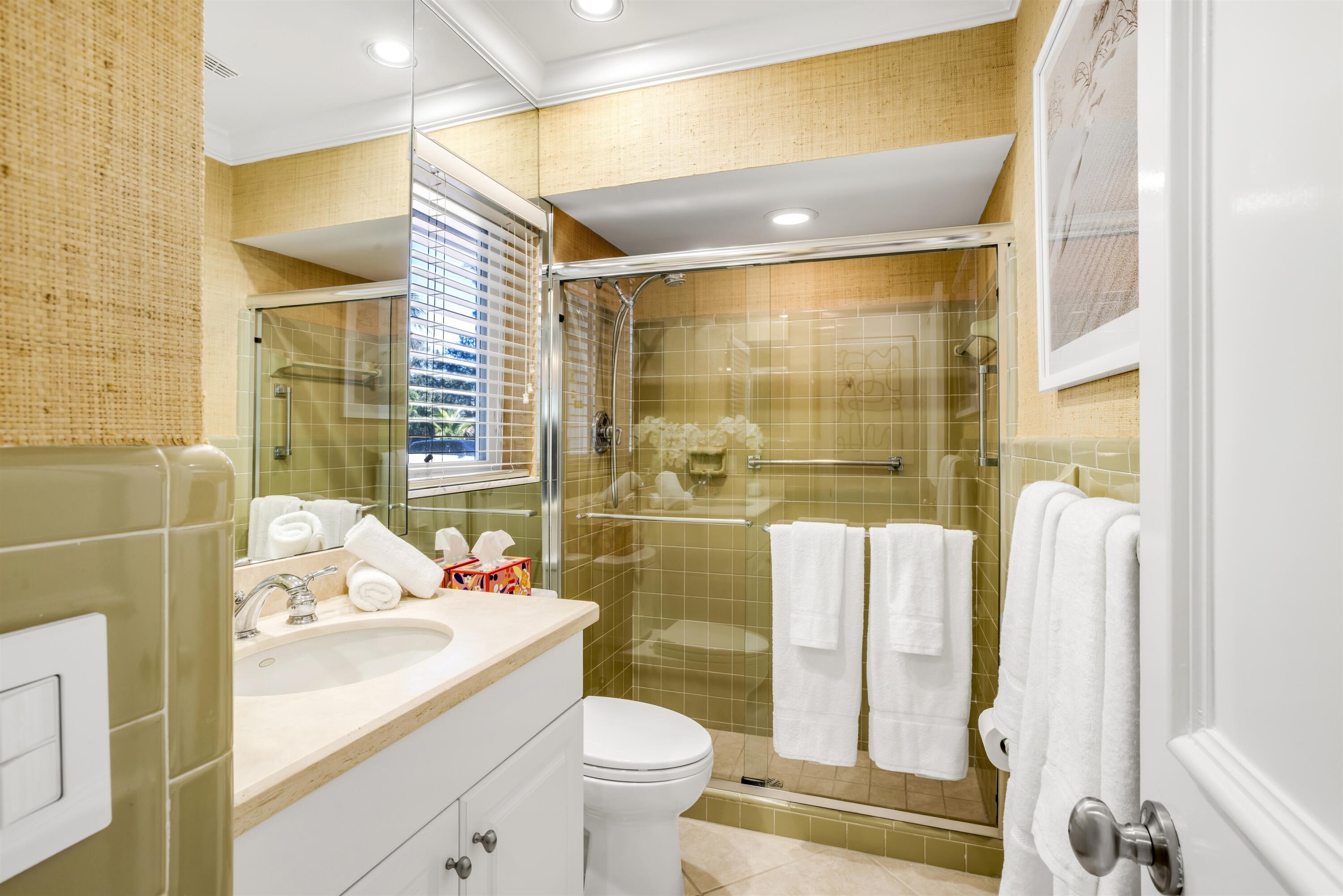 481 Northwest 5th Avenue Boca Raton, FL 33432 - Photo 22 of 28 a bathroom with a sink toilet and shower