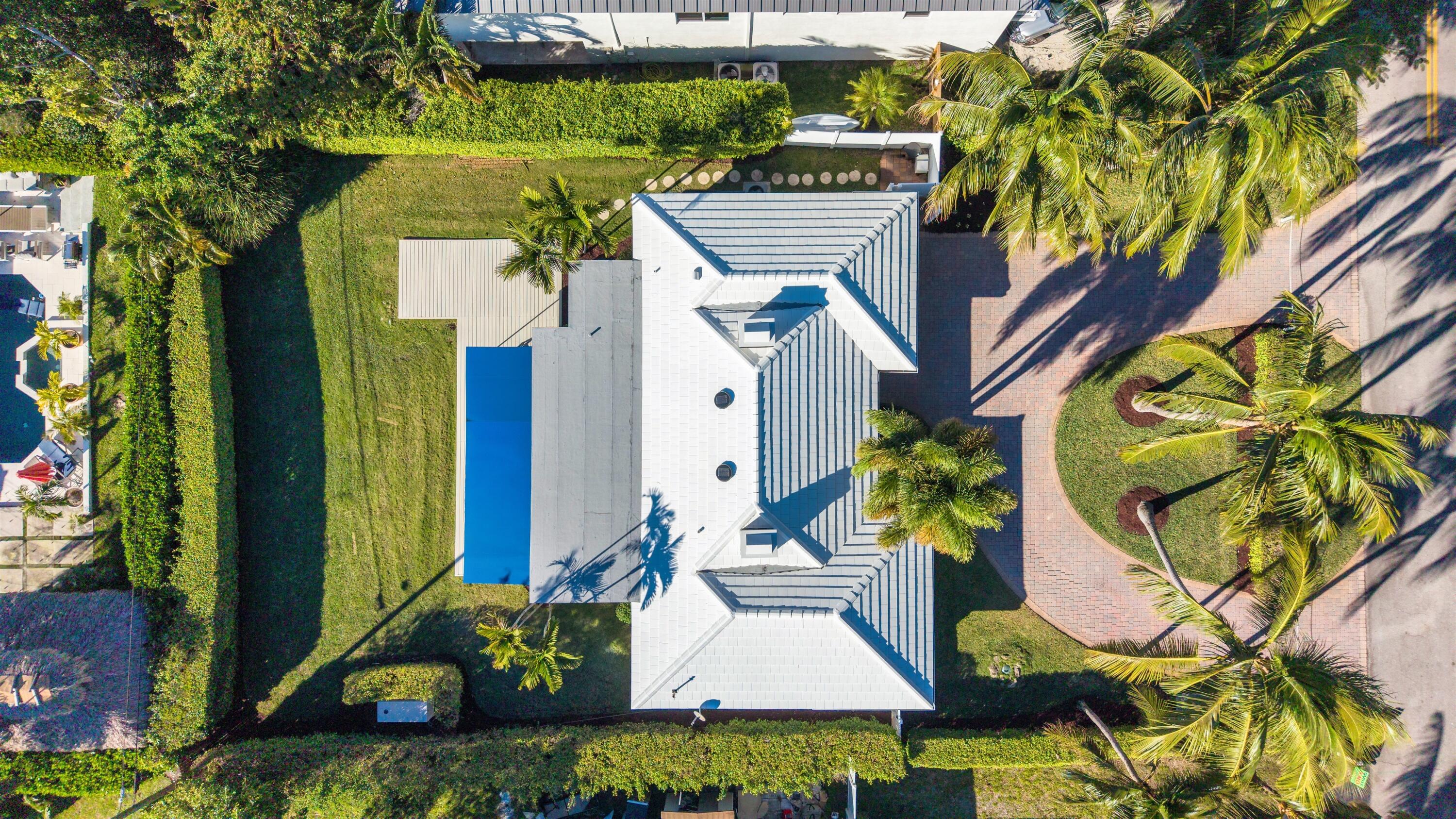 481 Northwest 5th Avenue Boca Raton, FL 33432 - Photo 28 of 28 a view of a house with a flower garden