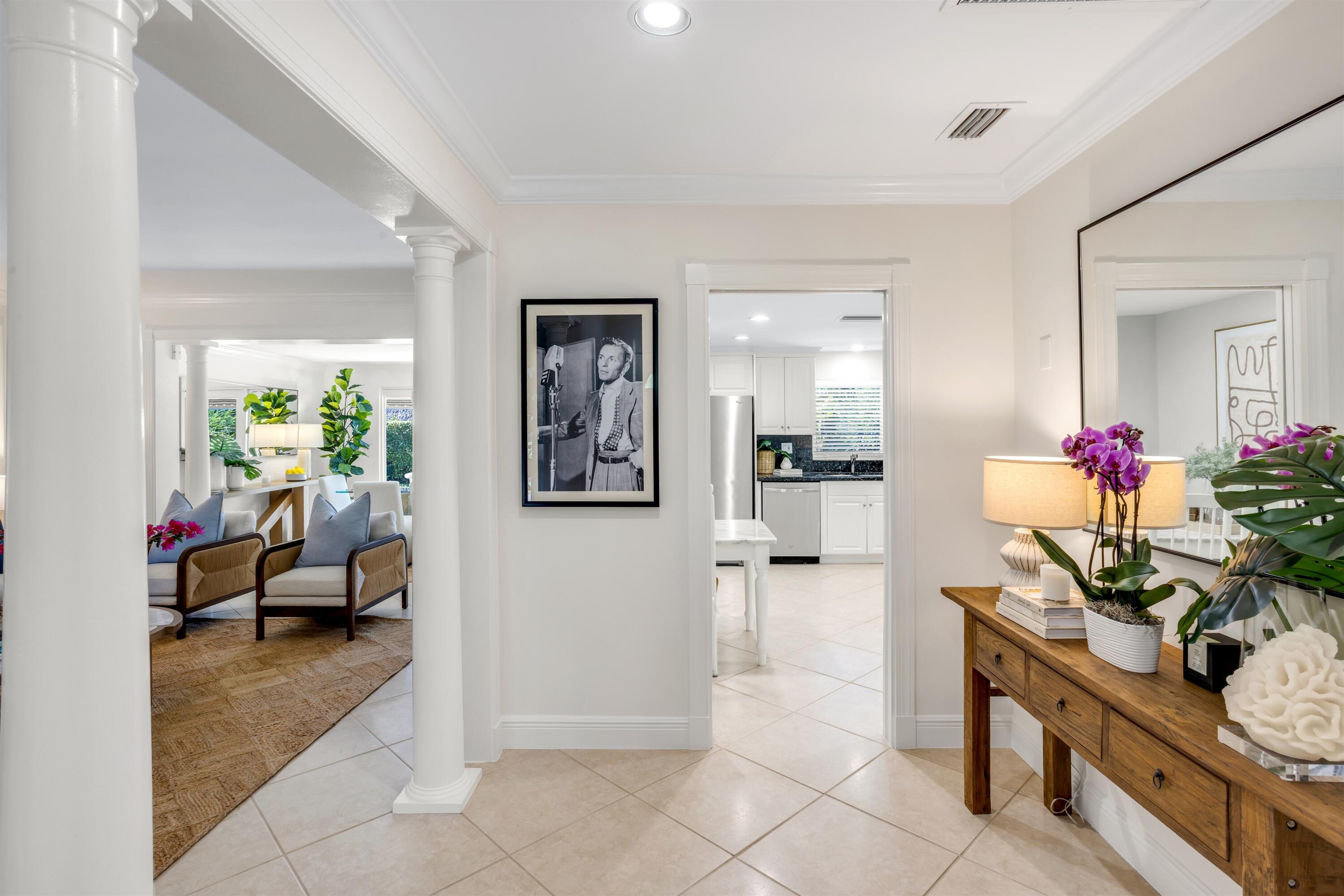 481 Northwest 5th Avenue Boca Raton, FL 33432 - Photo 3 of 28 a living room with furniture and flowers