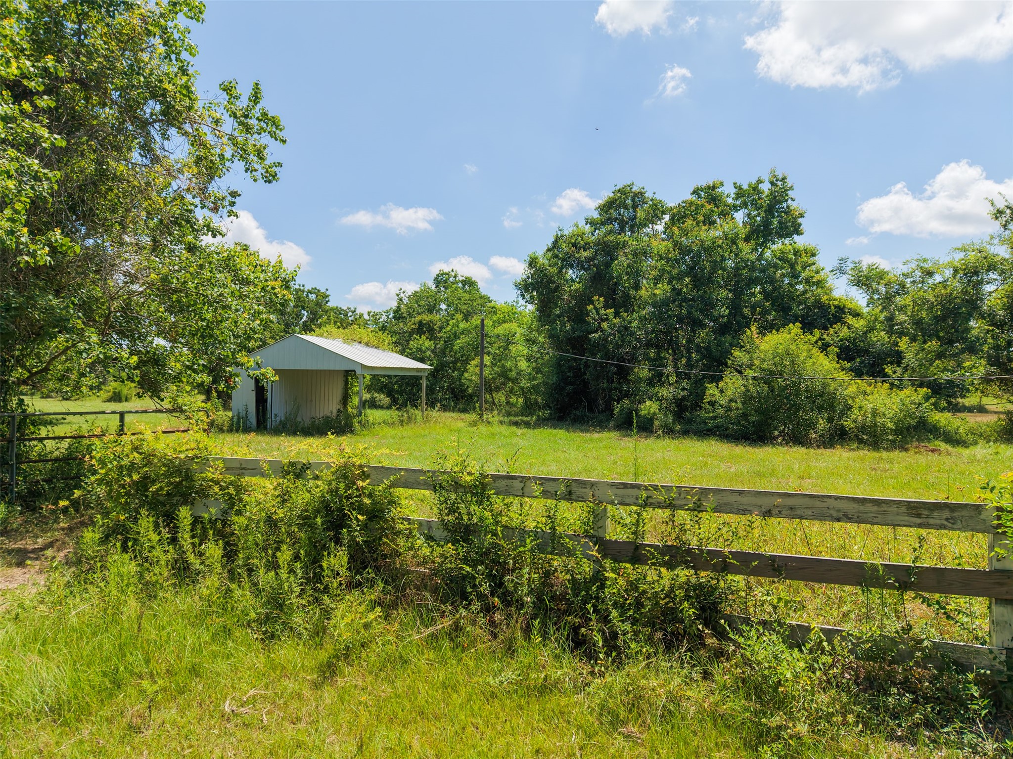 28619 Barry Lane Waller, TX 77484 - Photo 11 of 28 Detached storage building with easy access and ample surrounding space for equipment, supplies, or workshop use.