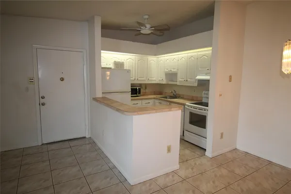 $129,000 | 9728 South Belfort Circle, Unit 206, Tamarac, FL 33321