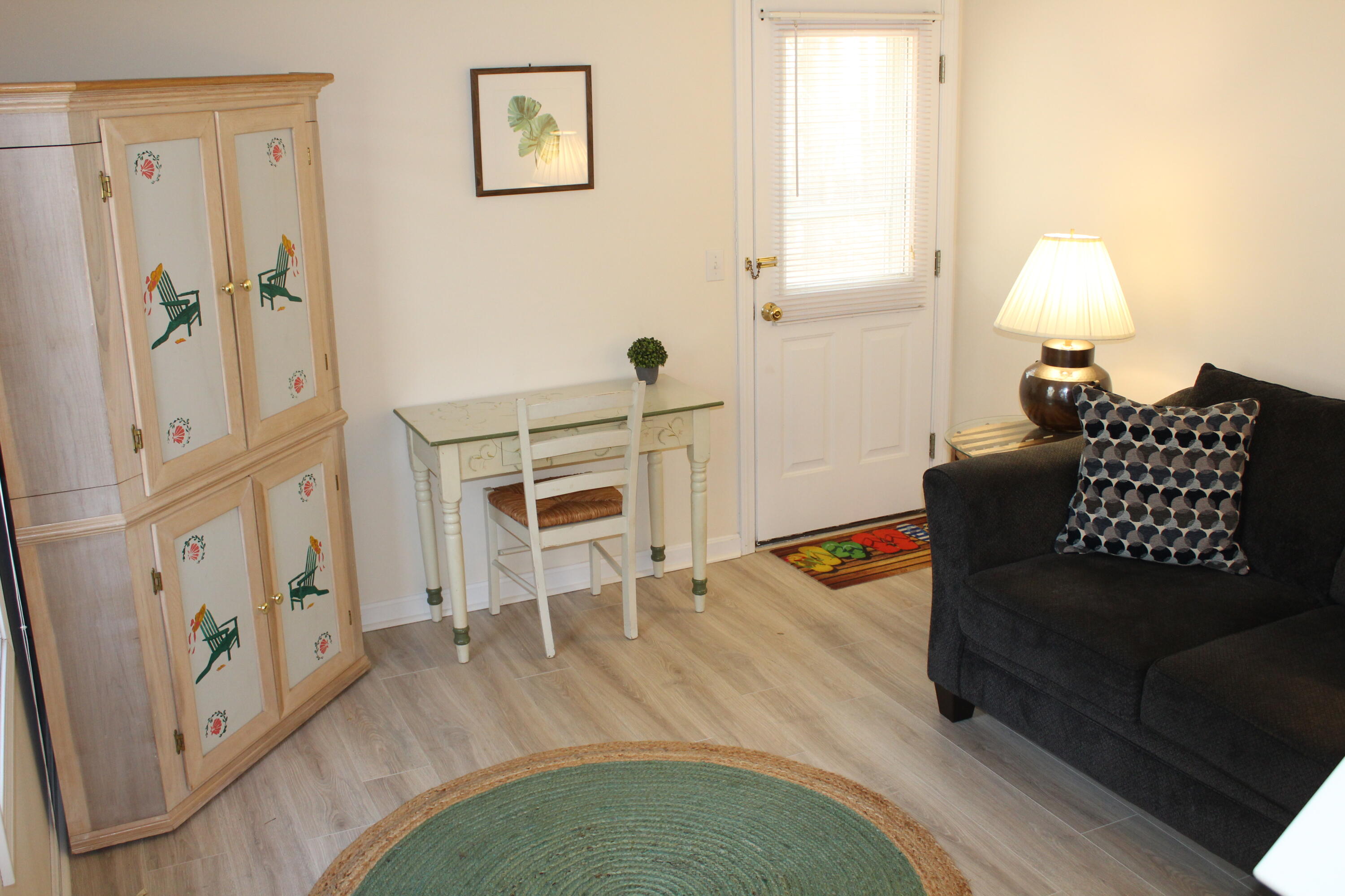 110 Degrass Road Mashpee, MA 02649 - Photo 15 of 46 a living room with furniture and a table