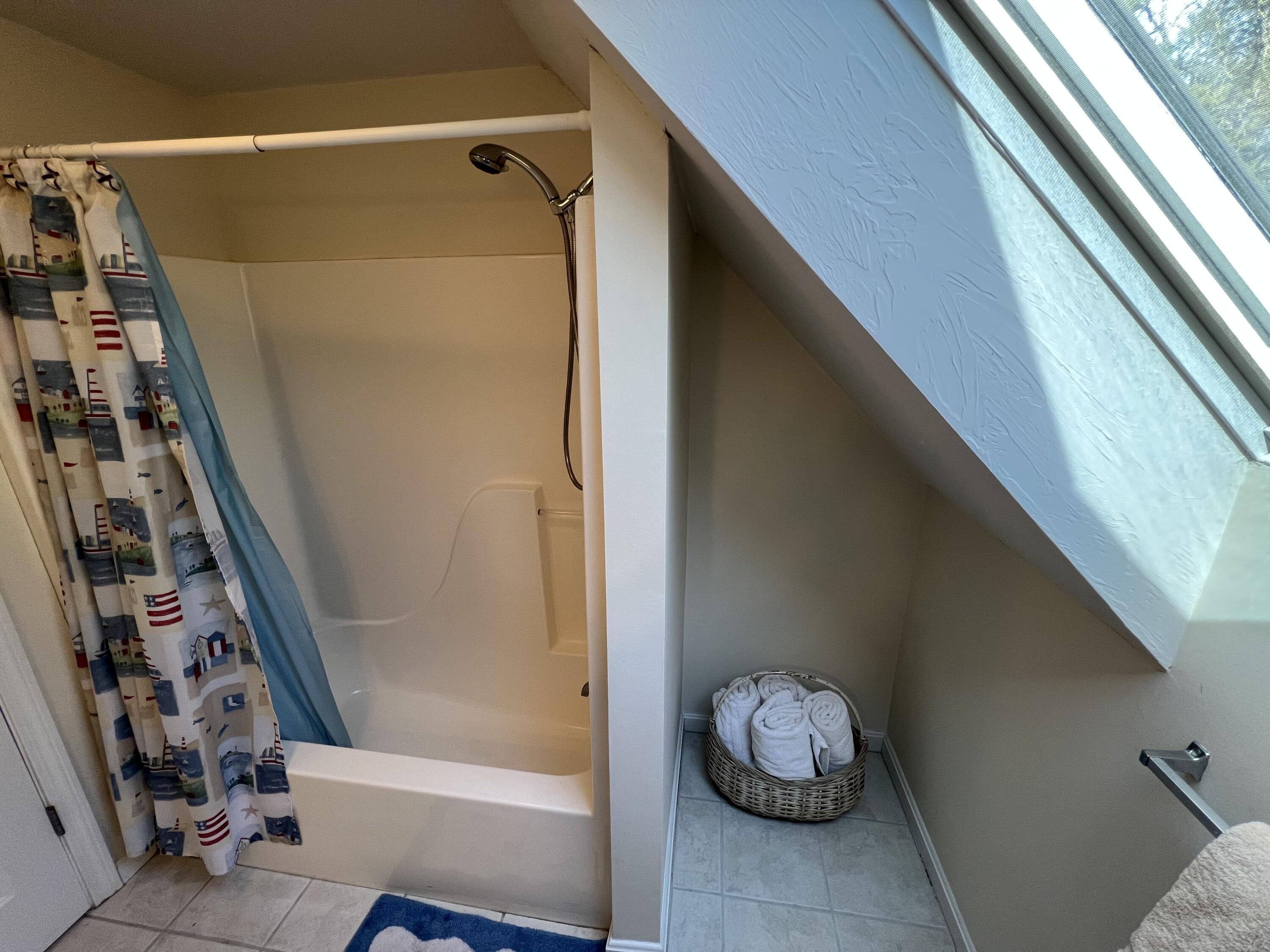 110 Degrass Road Mashpee, MA 02649 - Photo 28 of 46 a bathroom with a tub and shower
