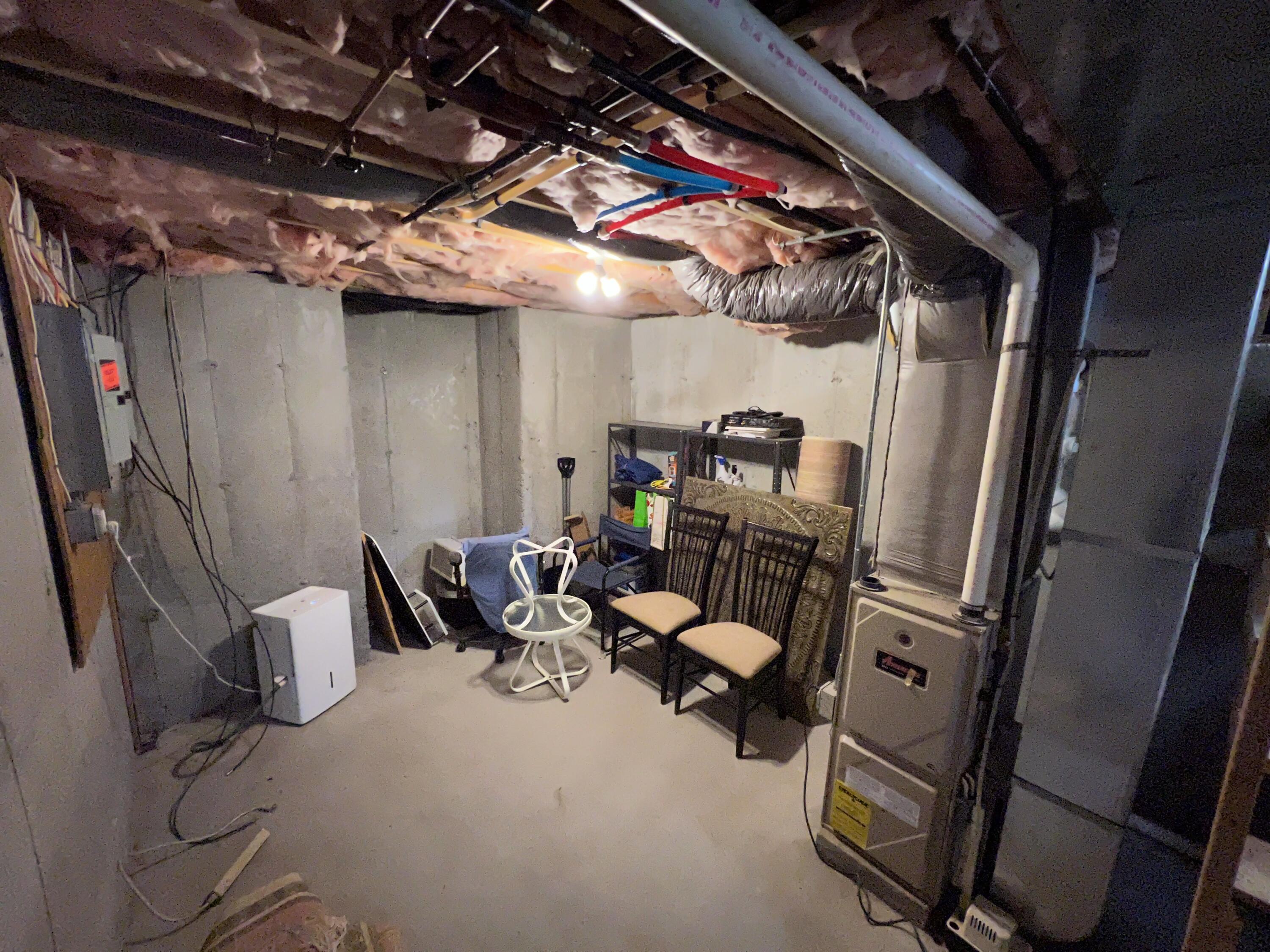 110 Degrass Road Mashpee, MA 02649 - Photo 40 of 46 a view of a storage room with furniture