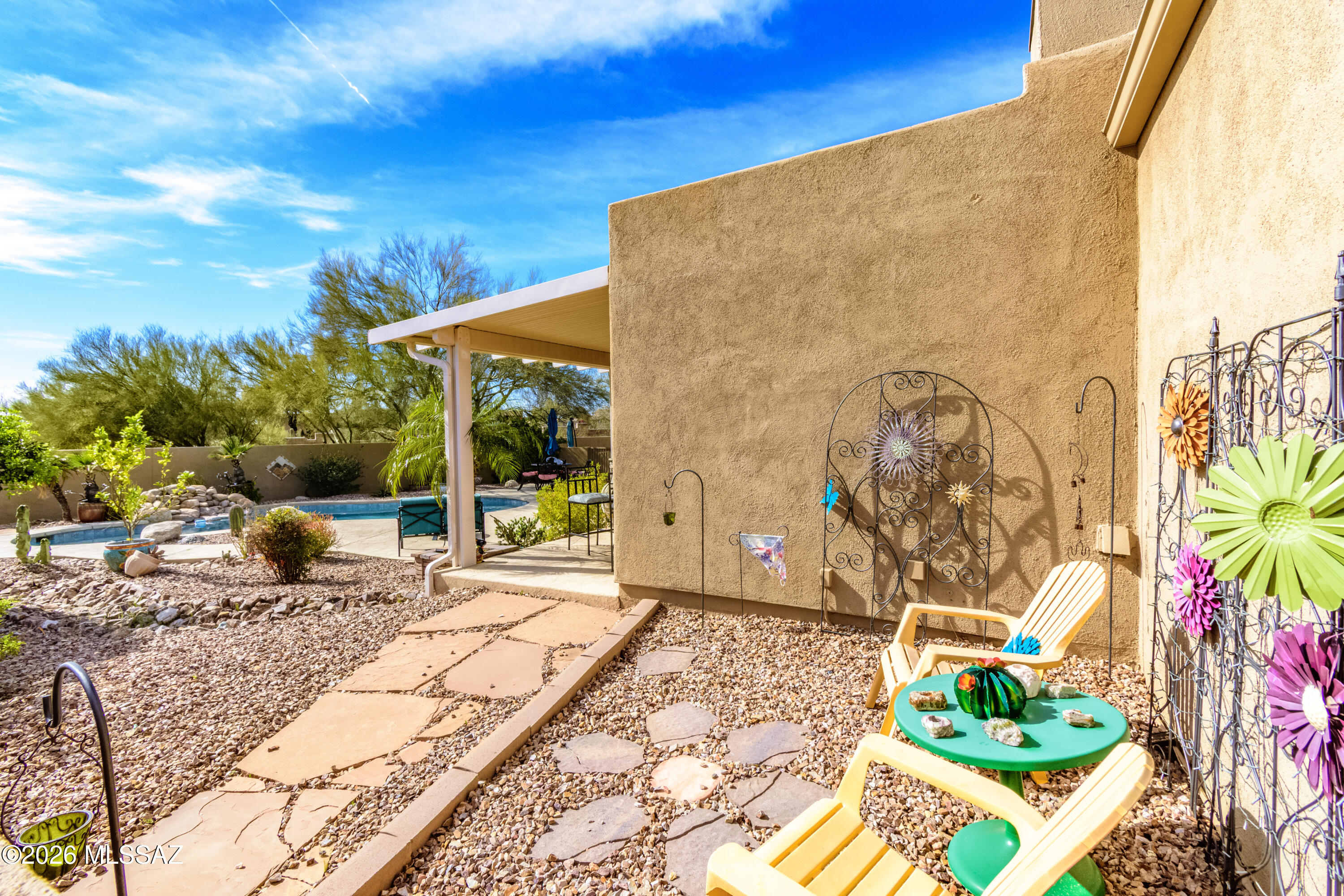 720 East Rudasill Road Tucson, AZ 85718 - Photo 35 of 48 At one time there was a smaller trampoline here. Now it's a private sitting area.