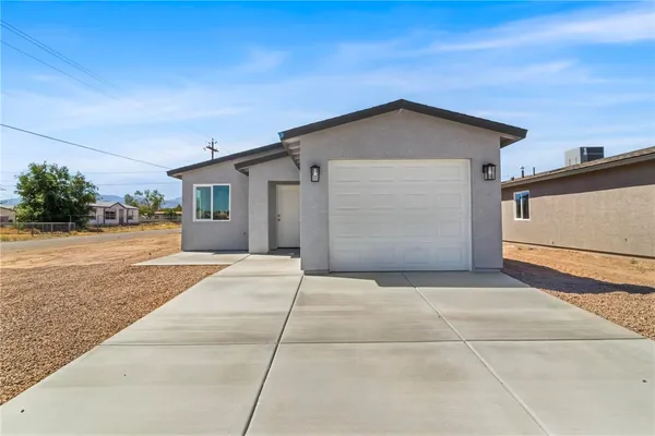 a view of backyard of house