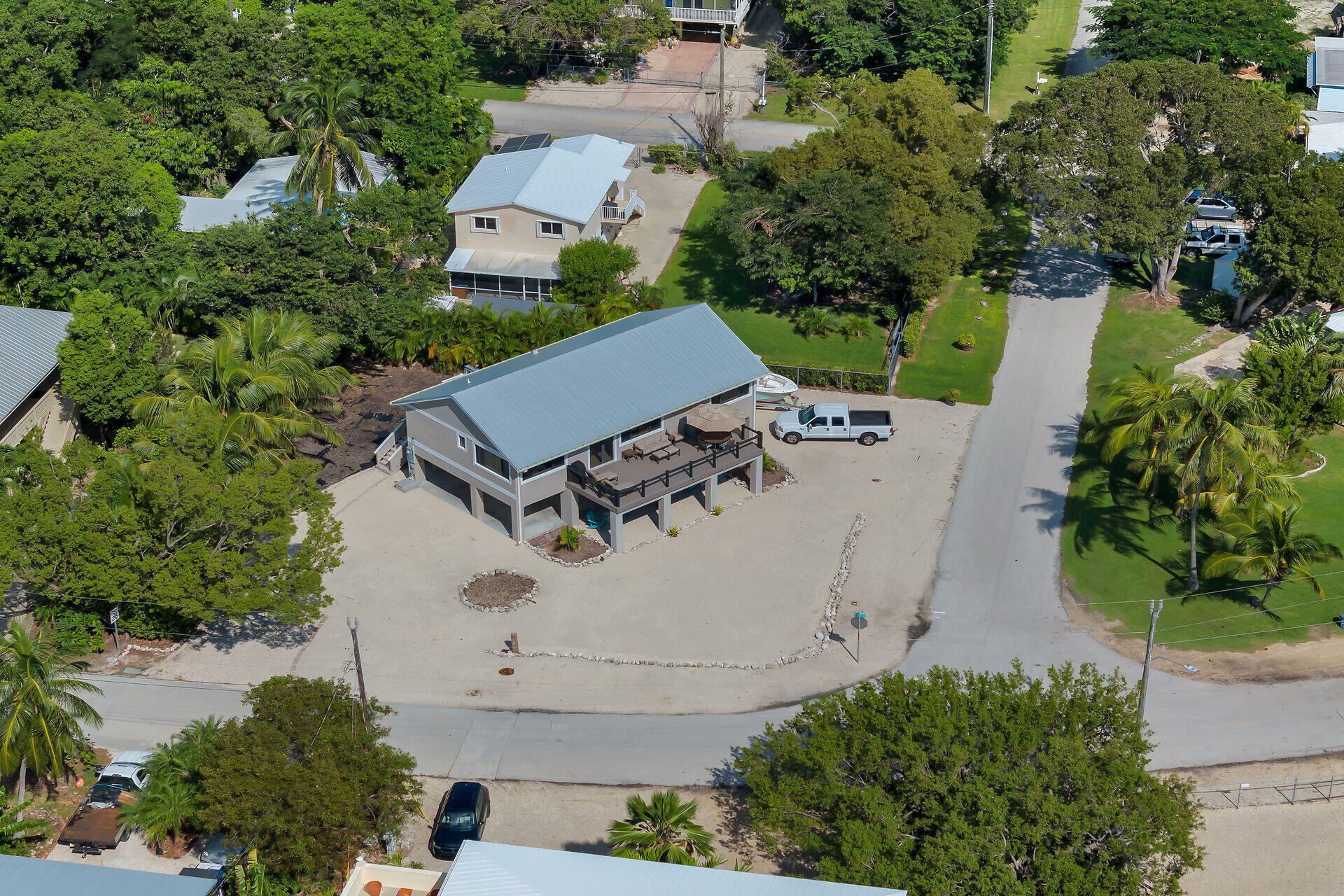 341 Sunset Drive Key Largo, FL 33037 - Photo 19 of 19 an aerial view of a house with a yard