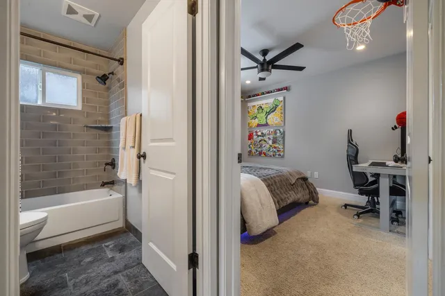 a en suite bathroom with a tub and a shower