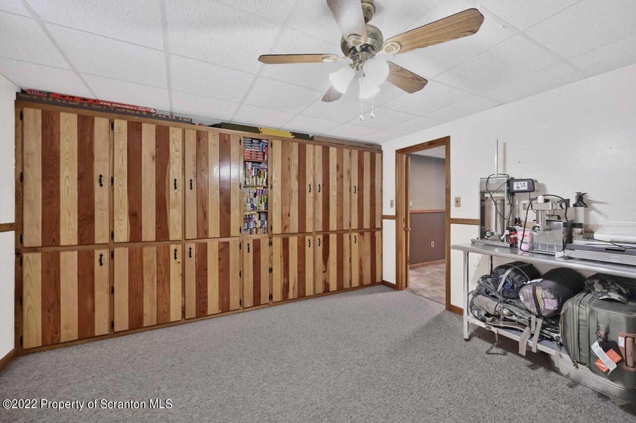 3560 State Rte 2012 Forest City, PA 18421 - Photo 44 of 63 a view of a livingroom with furniture and a ceiling fan