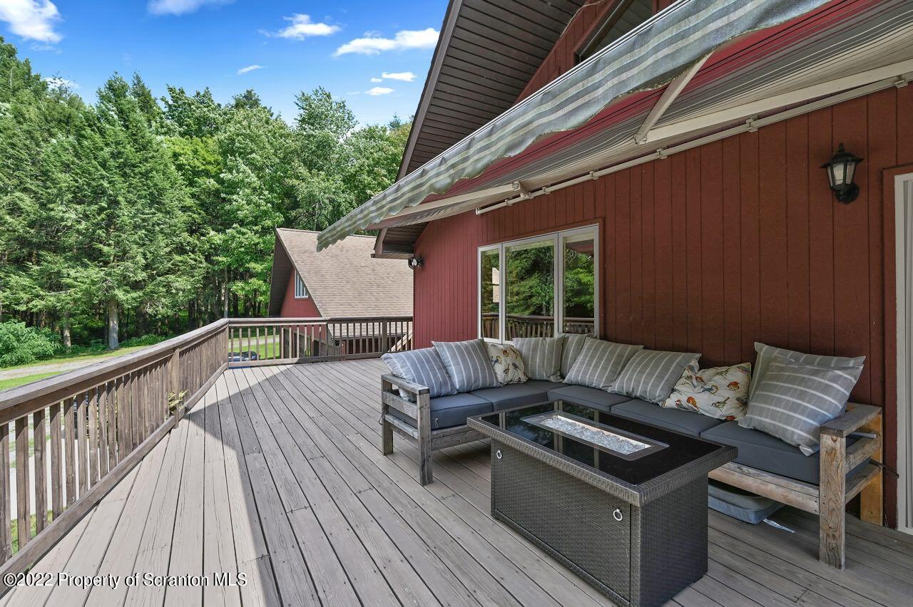 3560 State Rte 2012 Forest City, PA 18421 - Photo 45 of 63 a outdoor living space with furniture and a rug