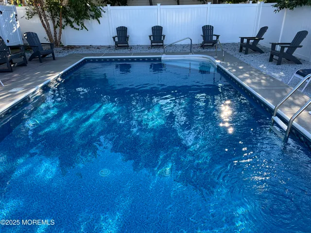 a view of swimming pool from a outdoor space