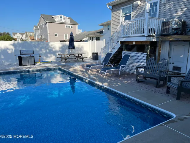 an ocean view with seating space