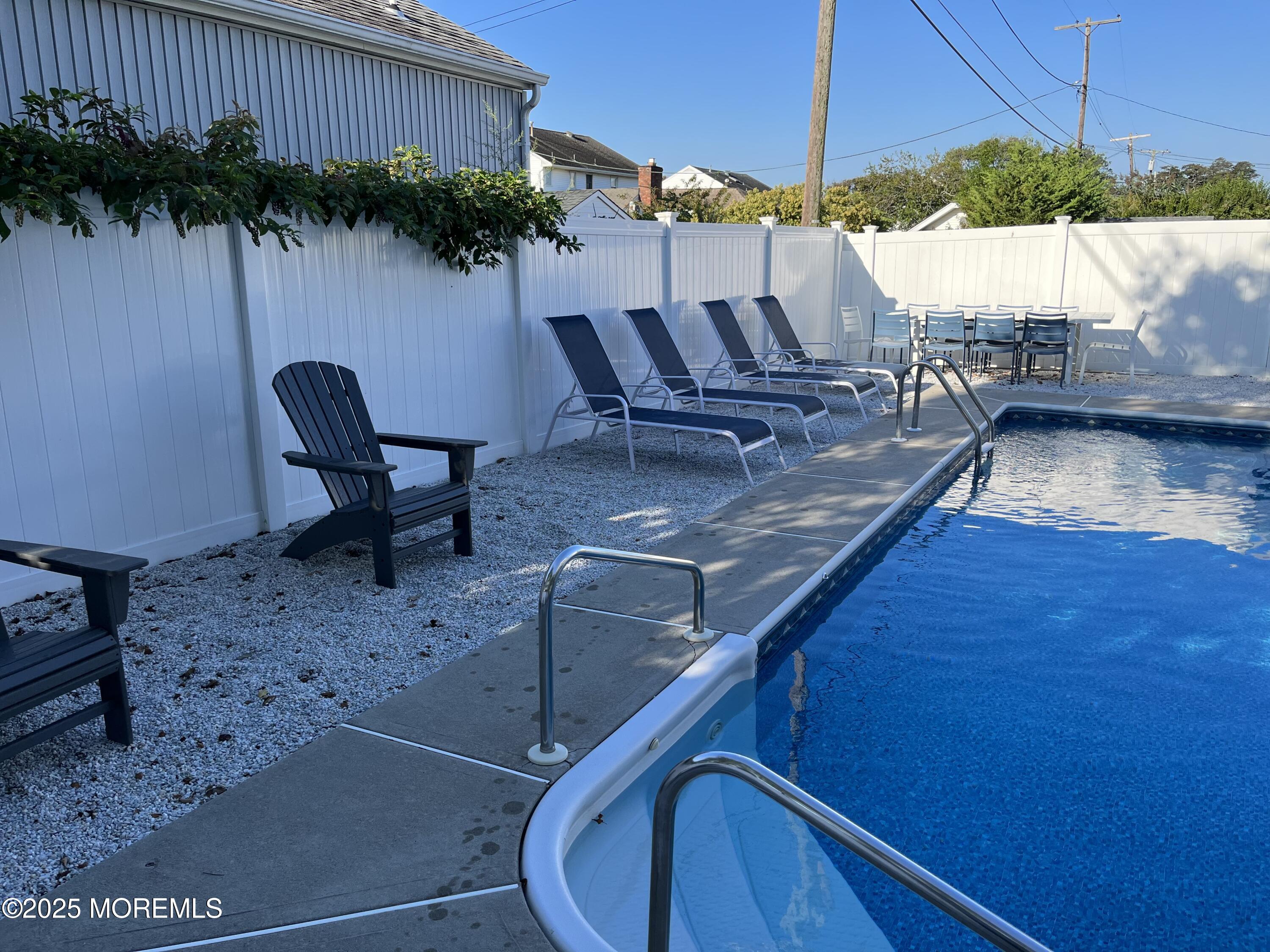 32 Niblick Street Point Pleasant Beach, NJ 08742 - Photo 26 of 31 swimming pool view with a seating space