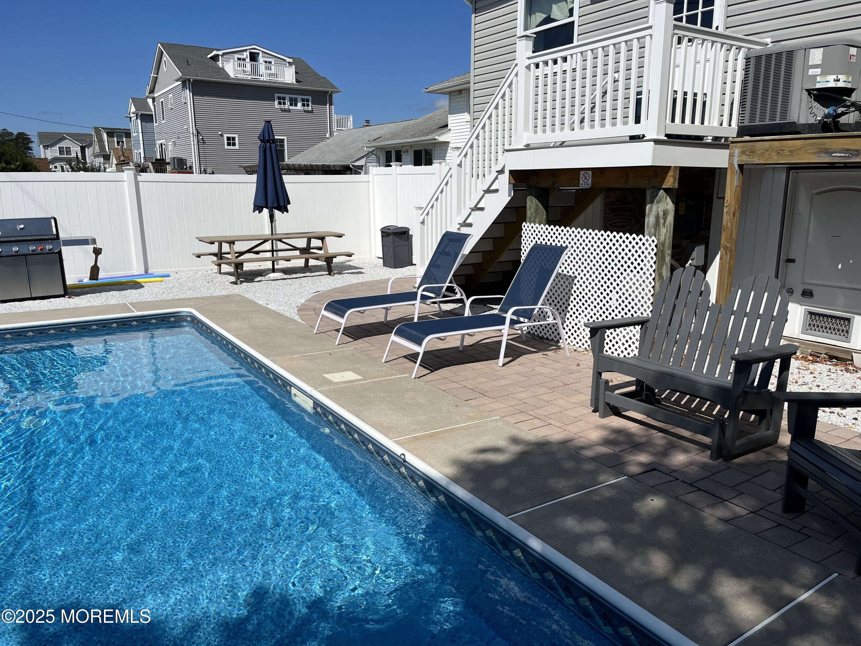 32 Niblick Street Point Pleasant Beach, NJ 08742 - Photo 29 of 31 a view of kitchen with furniture and outdoor seating