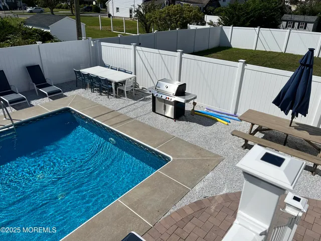 a view of outdoor space with seating area