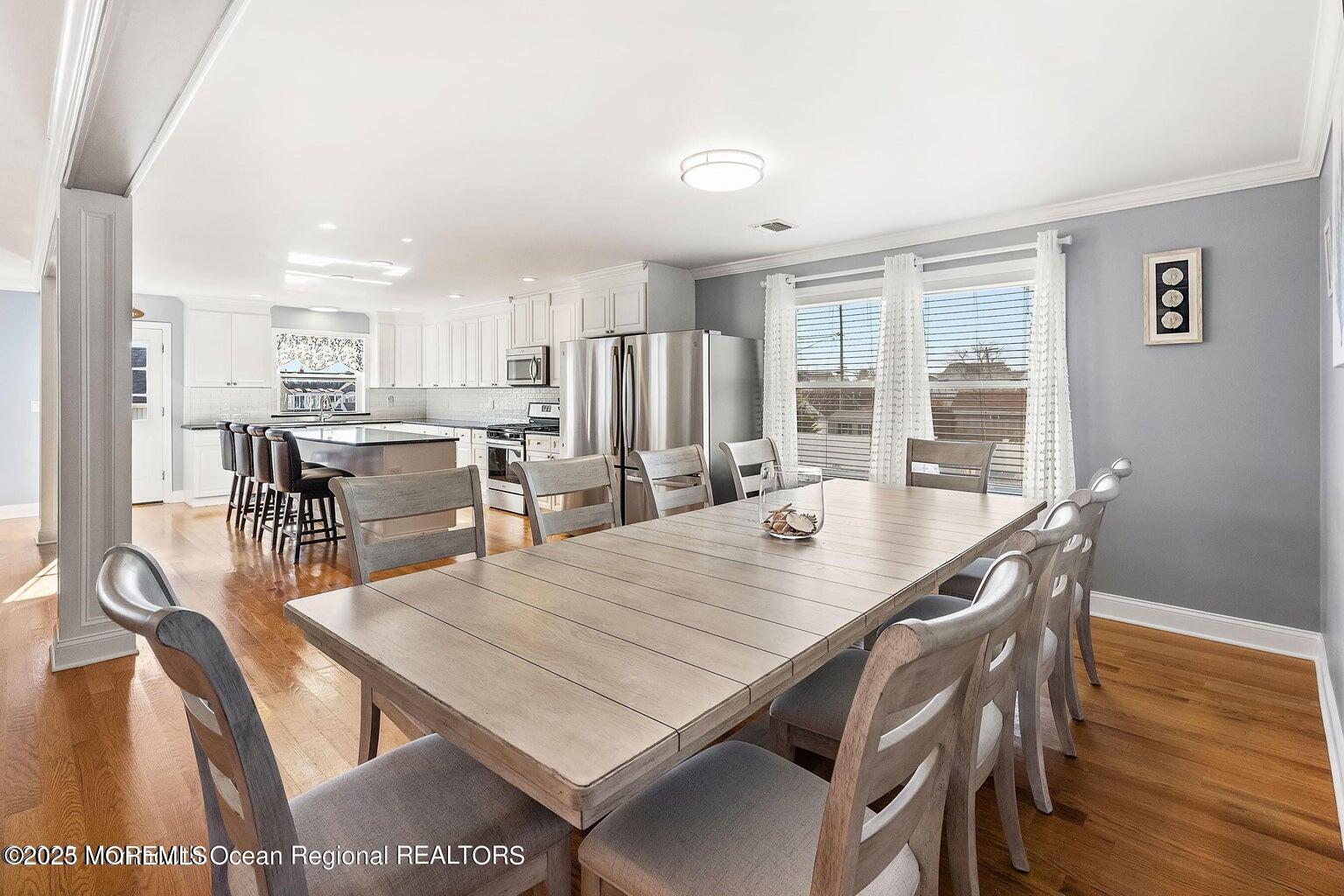 32 Niblick Street Point Pleasant Beach, NJ 08742 - Photo 5 of 31 a view of a dining room with furniture window and wooden floor