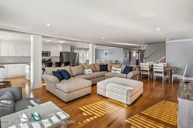 a living room with lots of furniture and rug view