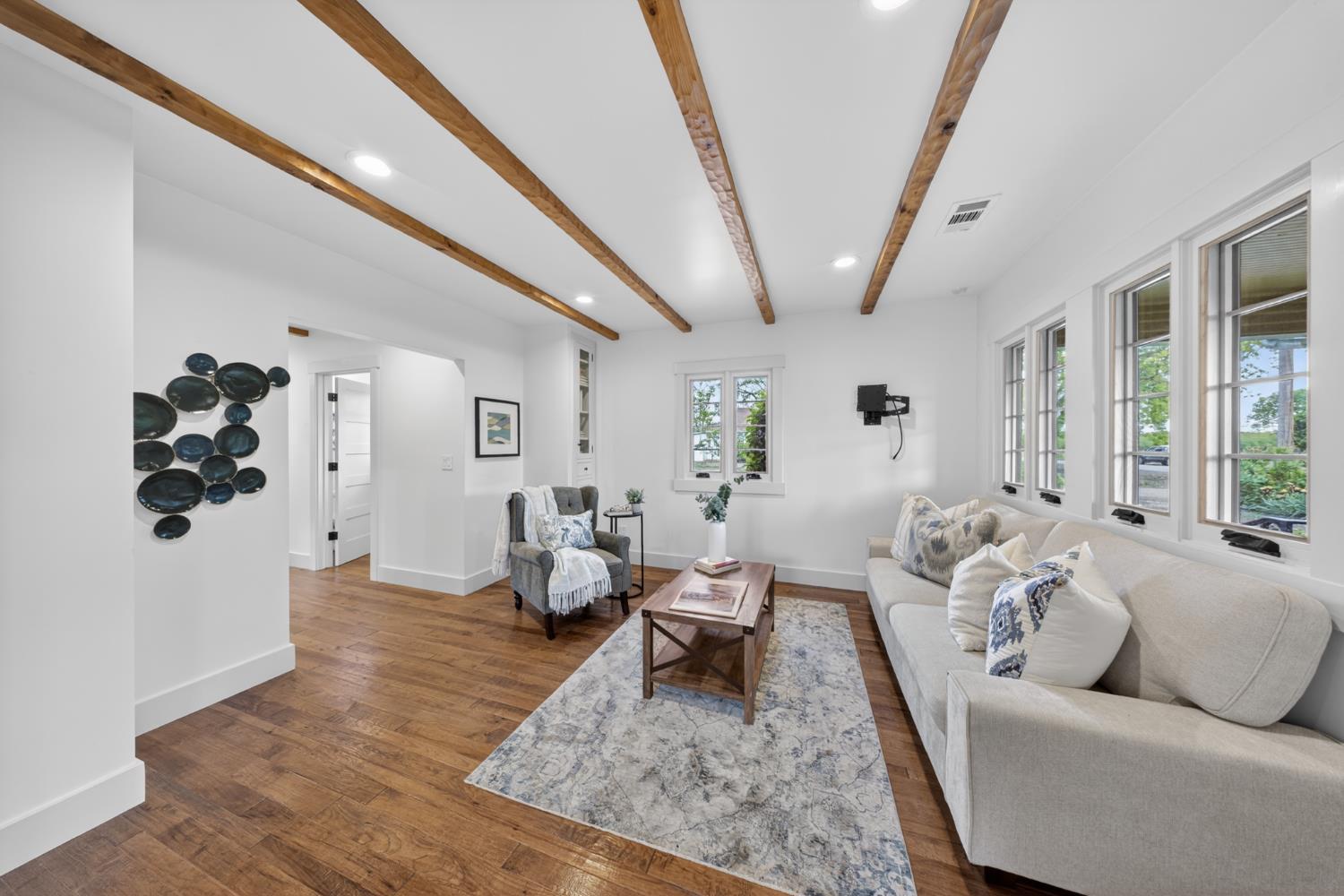 14621 East 8 Mile Road Linden, CA 95236 - Photo 12 of 38 a living room with furniture and wooden floor