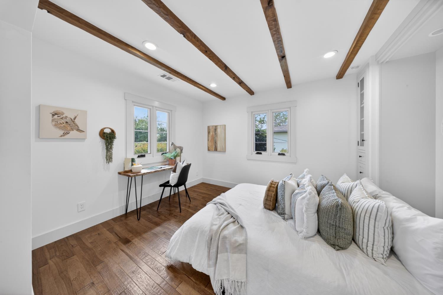 14621 East 8 Mile Road Linden, CA 95236 - Photo 16 of 38 a bedroom with a bed and a table in it