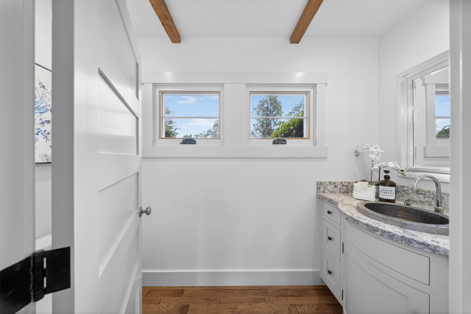 14621 East 8 Mile Road Linden, CA 95236 - Photo 17 of 38 a bathroom with a sink and a mirror
