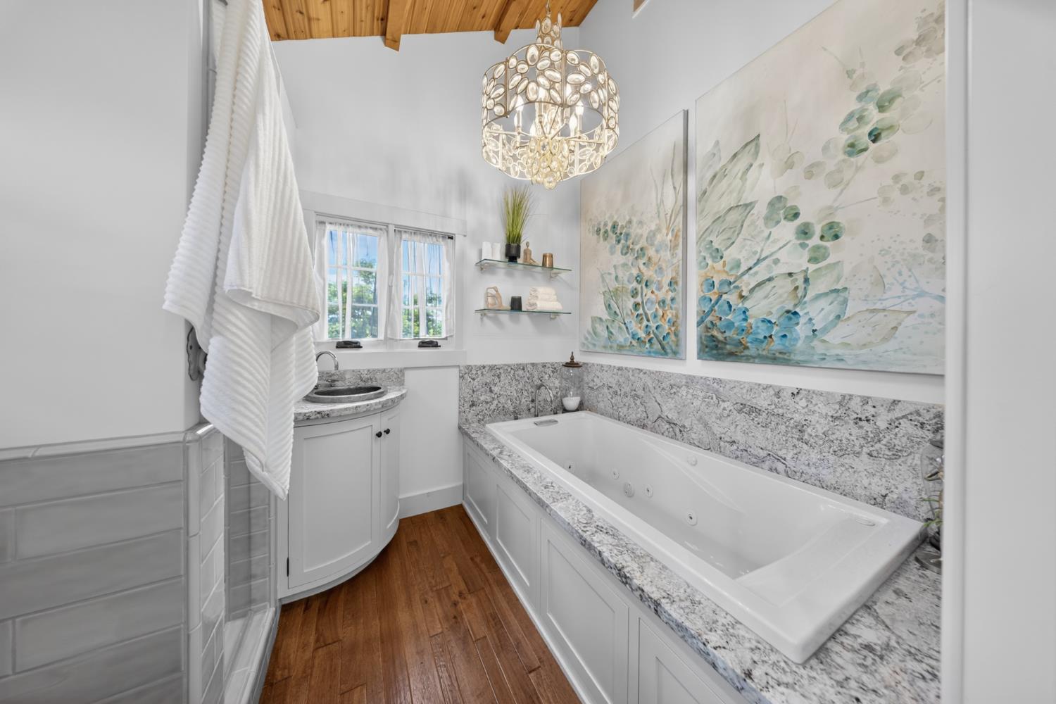 14621 East 8 Mile Road Linden, CA 95236 - Photo 20 of 38 a bathroom with a tub sink and mirror