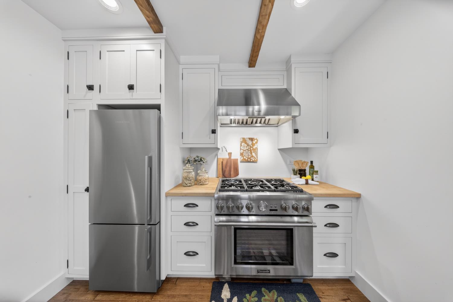 14621 East 8 Mile Road Linden, CA 95236 - Photo 26 of 38 a kitchen with stainless steel appliances a stove and a refrigerator