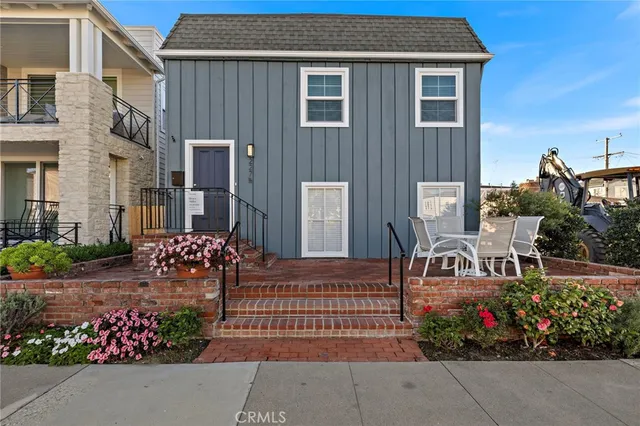 a view of a house that has a garden