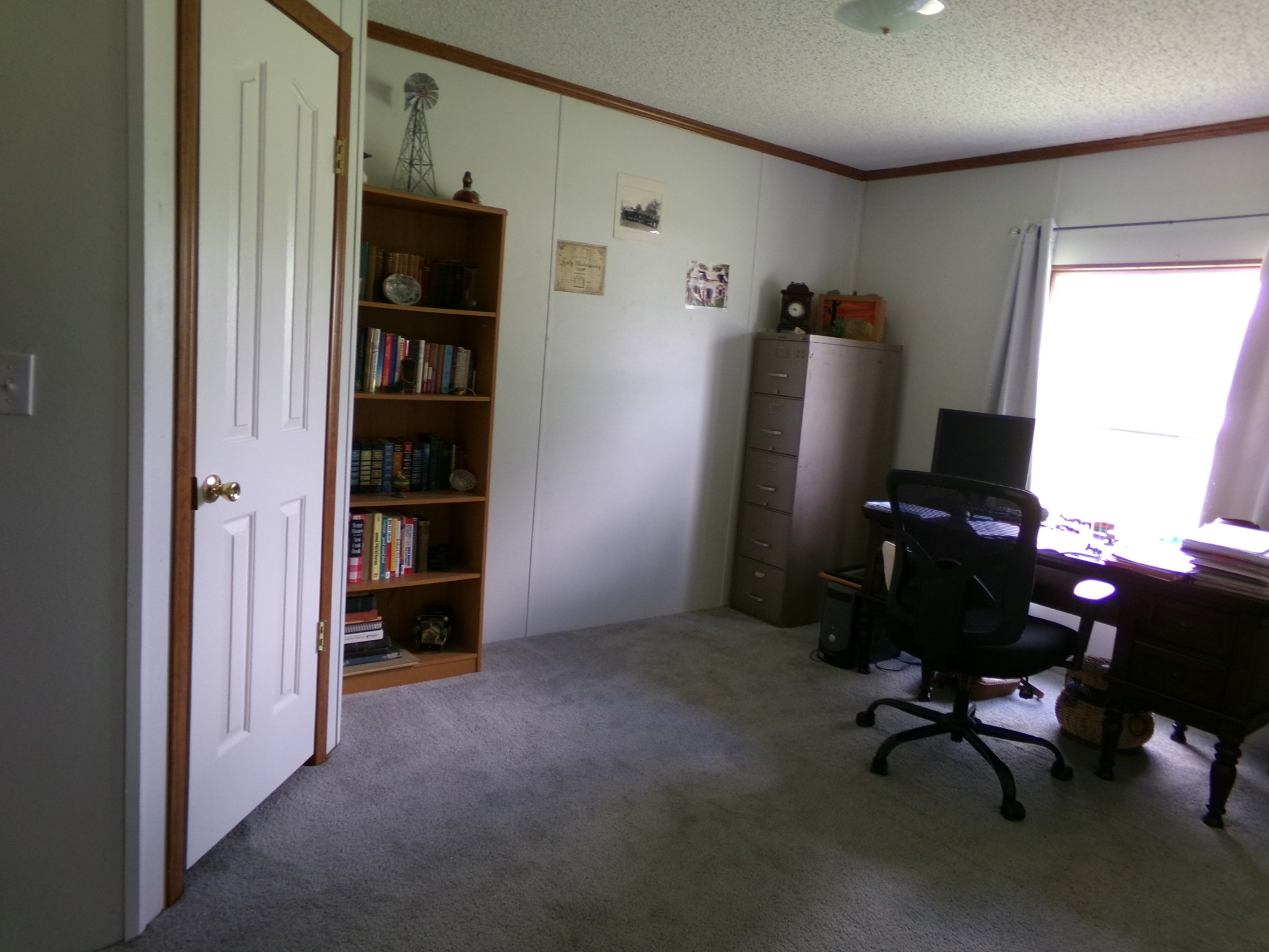 258 Paul Thompson Road Bethpage, TN 37022 - Photo 18 of 23 a view of a workspace with furniture and a window
