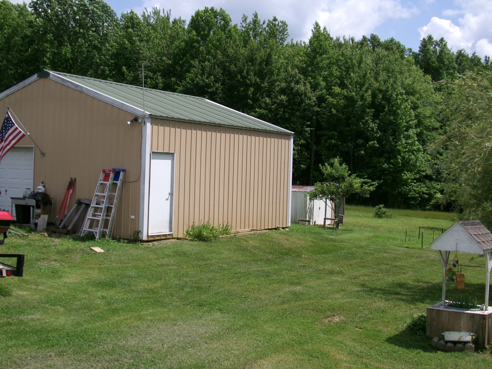 258 Paul Thompson Road Bethpage, TN 37022 - Photo 22 of 23 a backyard of a house with table and chairs
