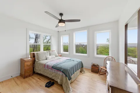 a bed room with a bed and a couch