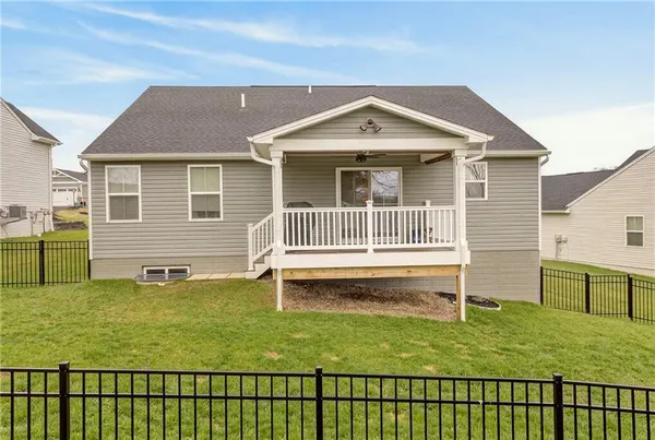 an aerial view of a house with a garden