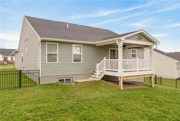 an aerial view of a house with a garden and plants