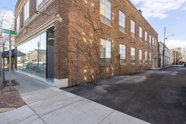 a view of a building with a street