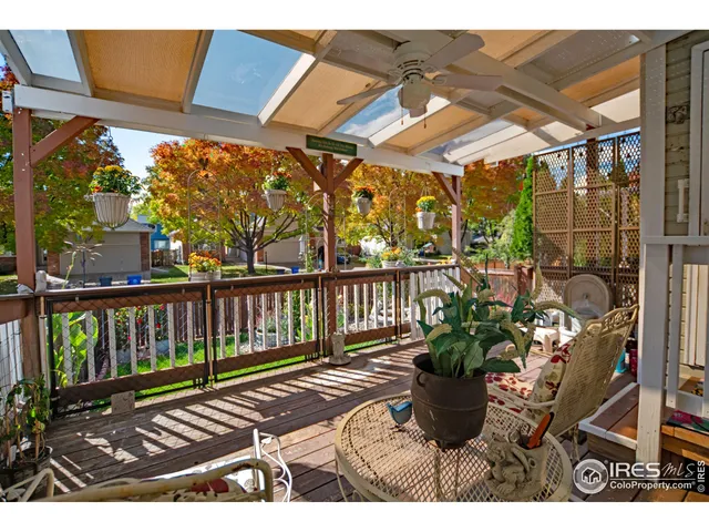 a view of a porch with wooden floor