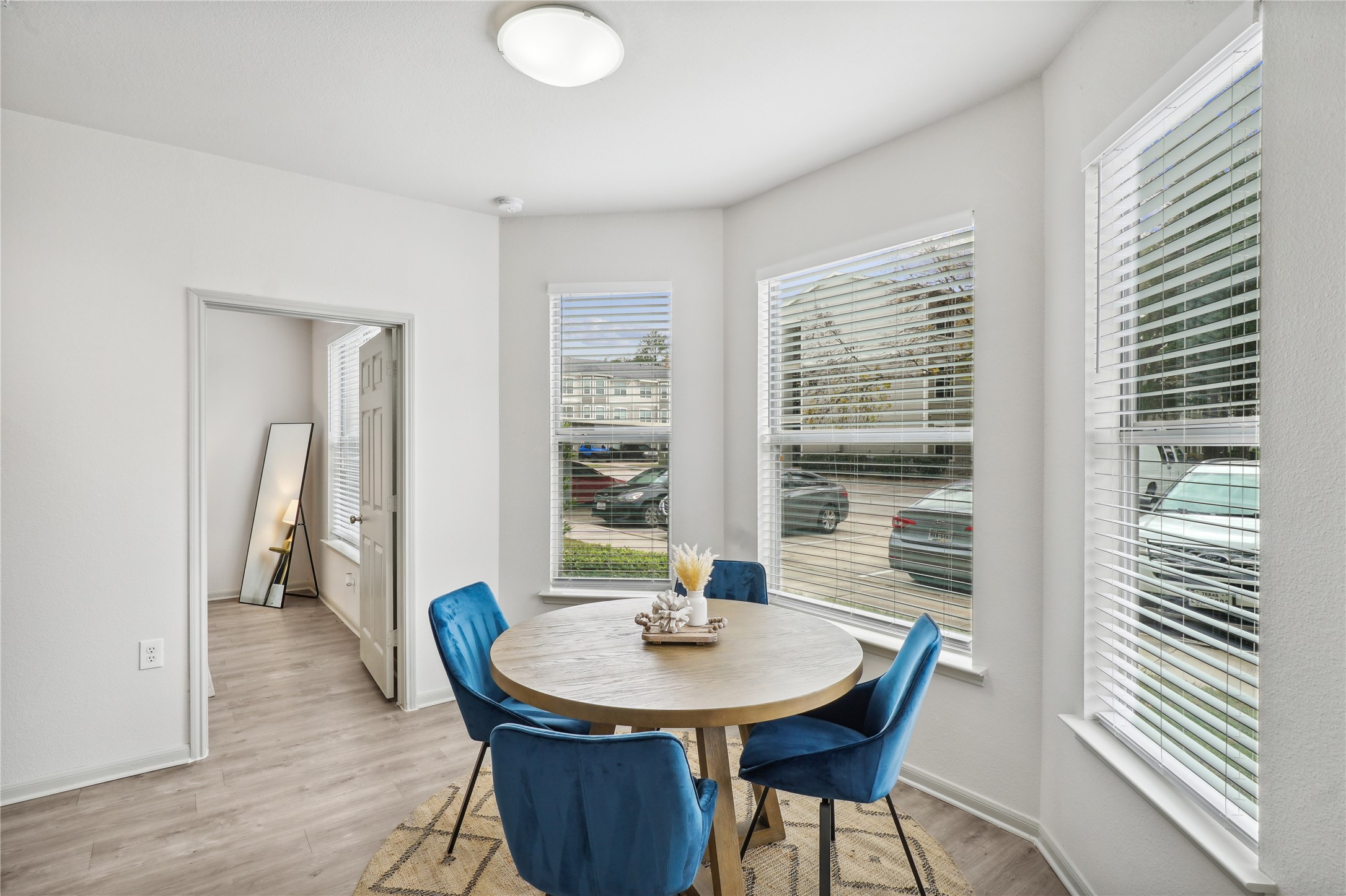 9494 Humble Westfield Road, Unit 934 Humble, TX 77338 - Photo 12 of 22 a view of a dining room with furniture and window