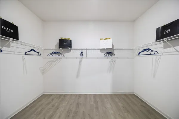 a room with a refrigerator and a television