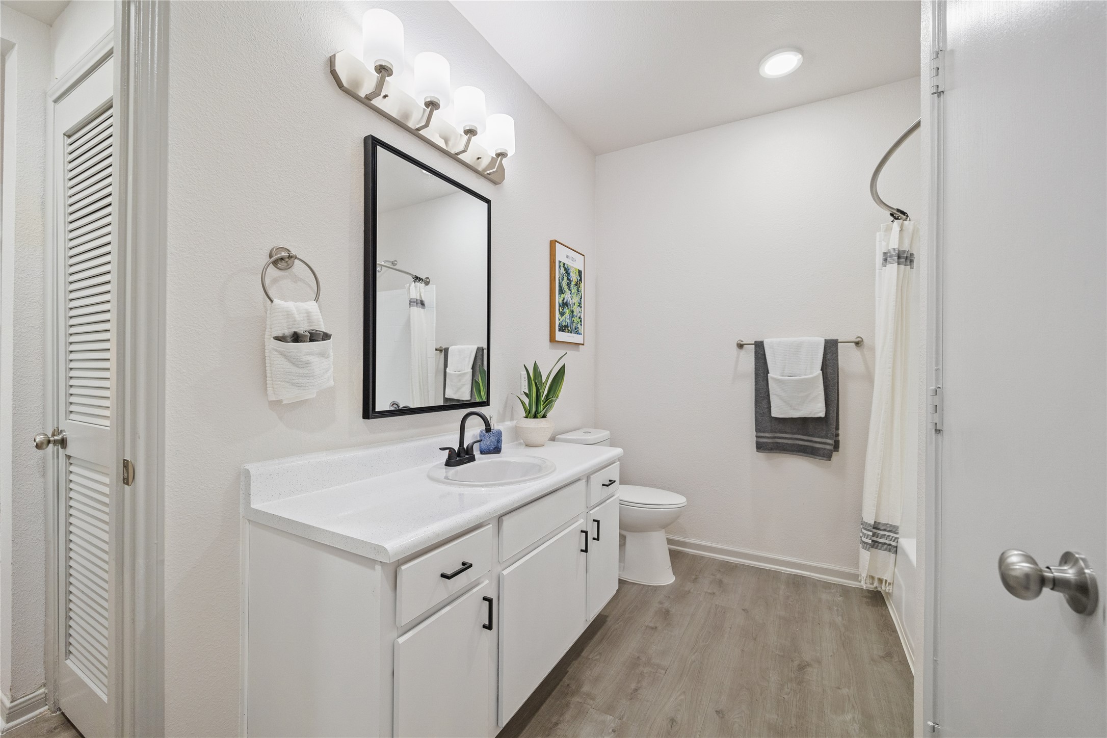 9494 Humble Westfield Road, Unit 934 Humble, TX 77338 - Photo 17 of 22 a spacious bathroom with a double vanity sink mirror and