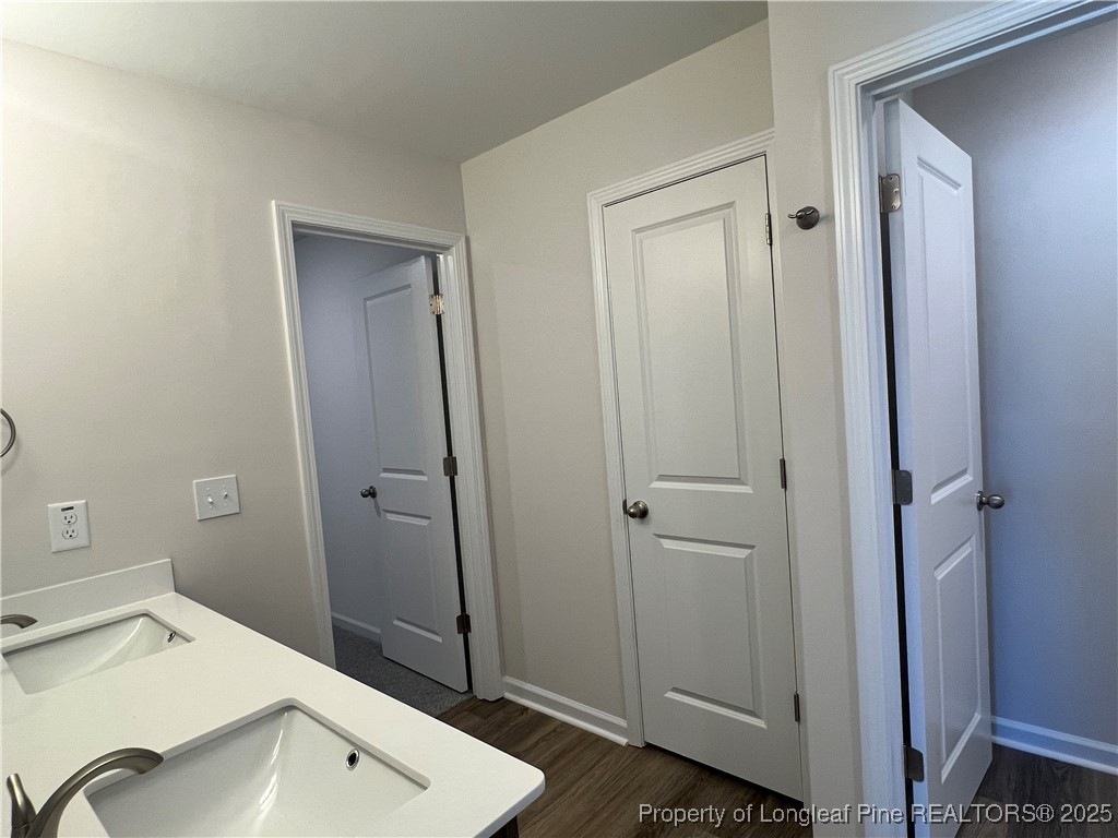 528 Traveller Way Raeford, NC 28376 - Photo 18 of 23 a bathroom with a sink and a mirror