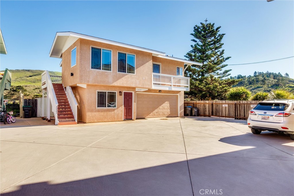 2023 Circle Cayucos, CA 93430 - Photo 18 of 44 a car parked in front of a house