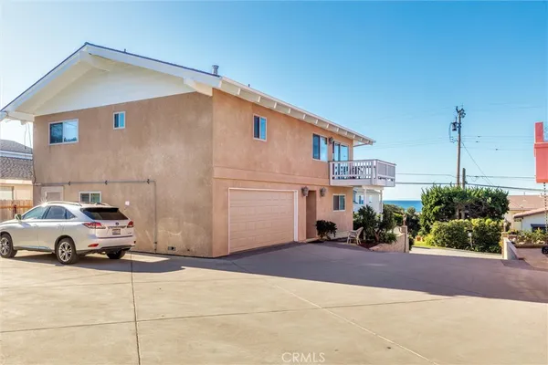 a car parked in front of a house