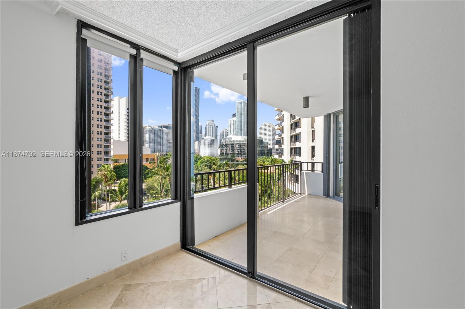 520 Brickell Key Drive, Unit A705 Miami, FL 33131 - Photo 23 of 63 a view of a glass door and front door