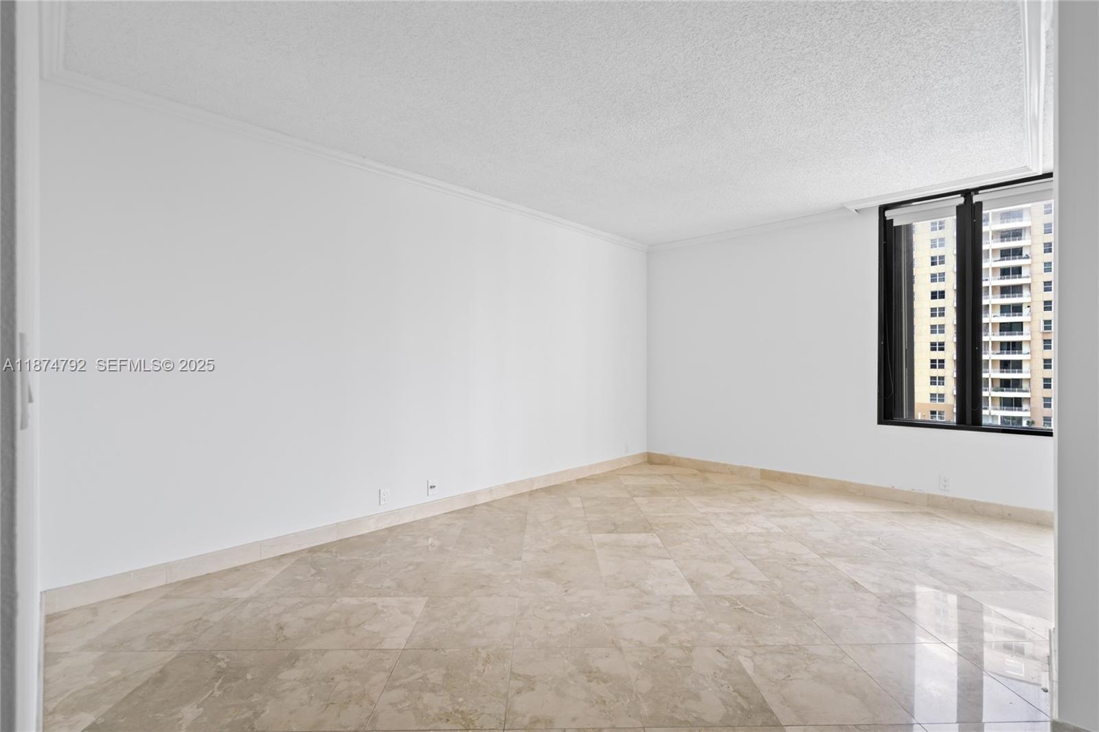 520 Brickell Key Drive, Unit A705 Miami, FL 33131 - Photo 24 of 63 an empty room with windows