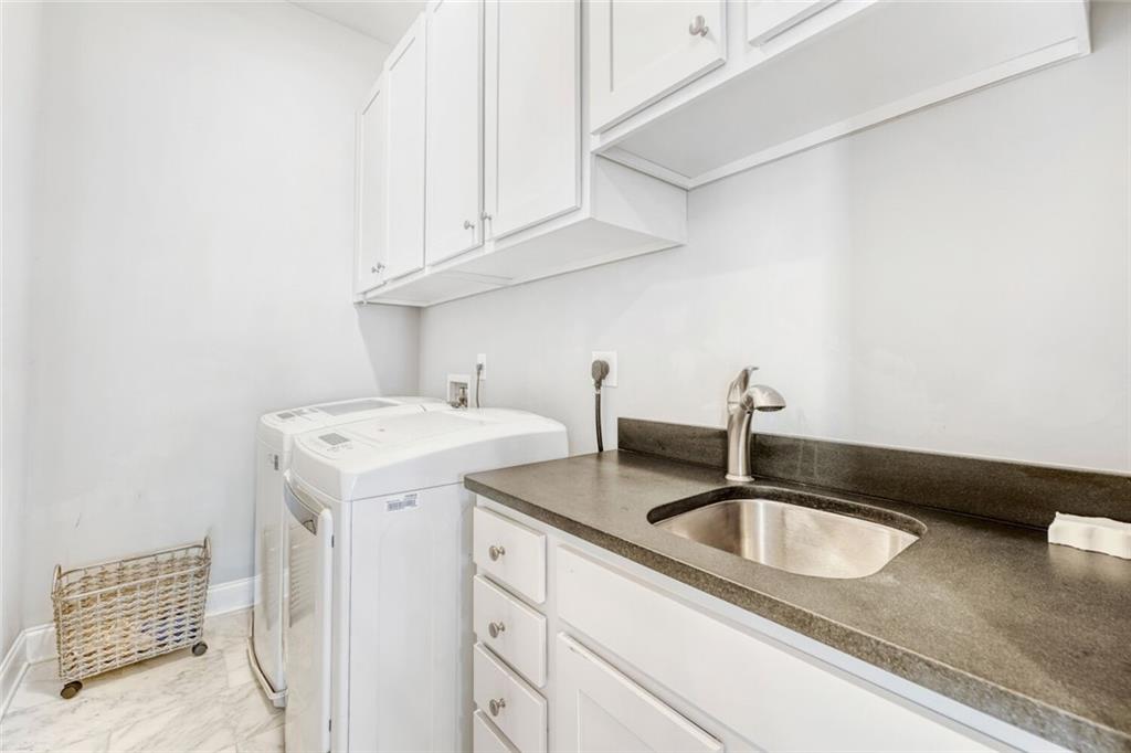 1196 John Collier Road Northwest, Unit 1196 Atlanta, GA 30318 - Photo 20 of 26 a close view of sink and tap