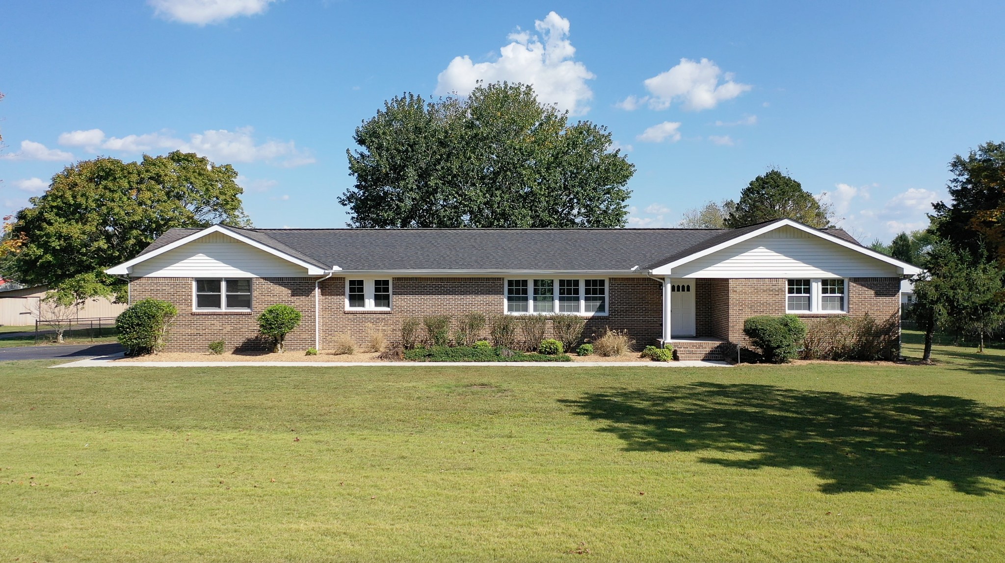 191 Blanton Chapel Road Manchester, TN 37355 - Photo 2 of 26 a front view of a house with a yard