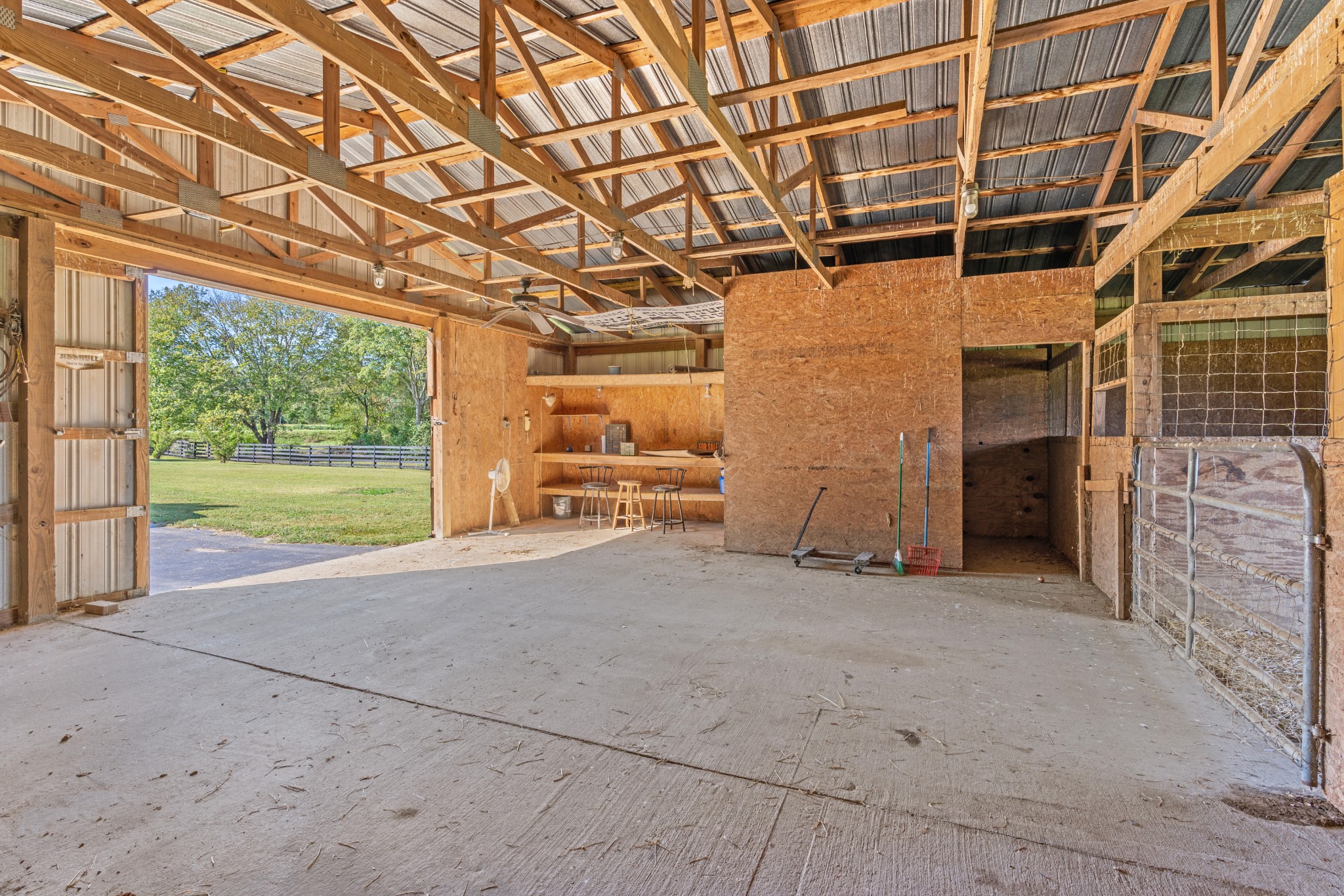 191 Blanton Chapel Road Manchester, TN 37355 - Photo 23 of 26 a view of a room with wooden walls and iron stairs
