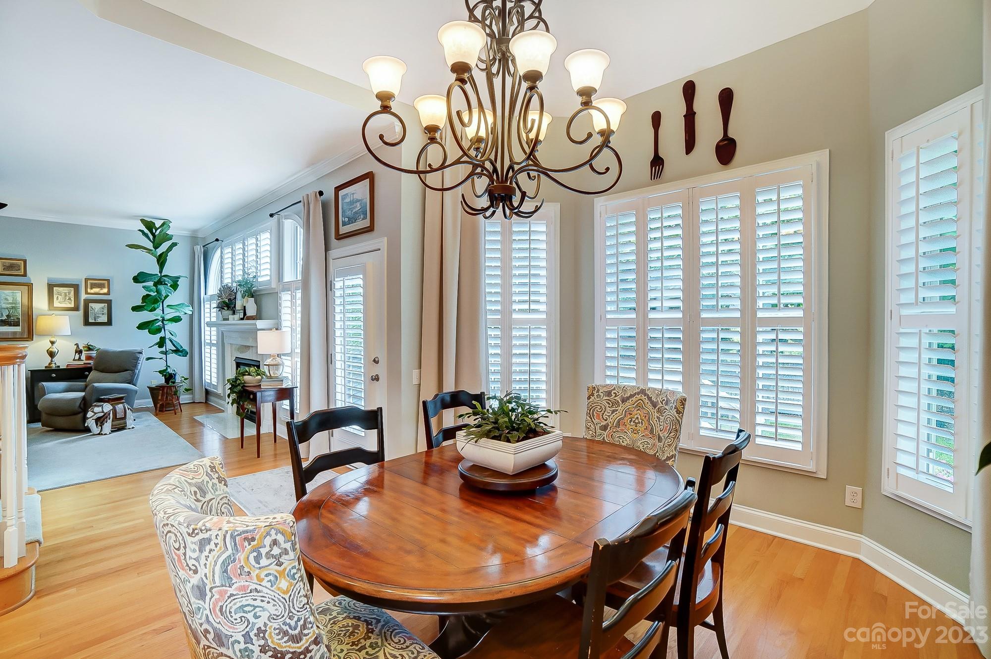1105 Legacy Lane Fort Mill, SC 29708 - Photo 15 of 43 a view of a dining room with furniture window and wooden floor
