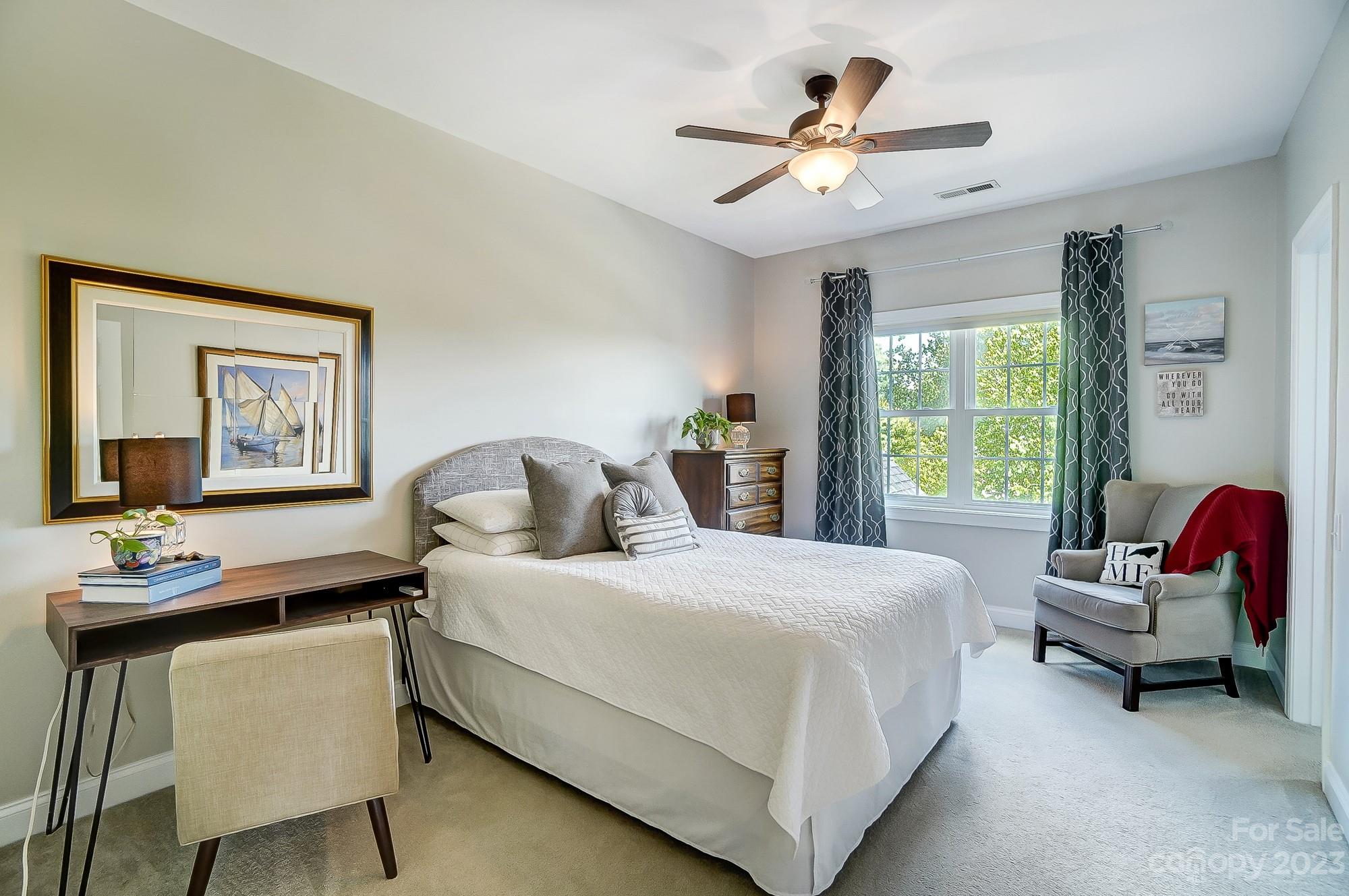 1105 Legacy Lane Fort Mill, SC 29708 - Photo 28 of 43 a bedroom with a bed chair and a window