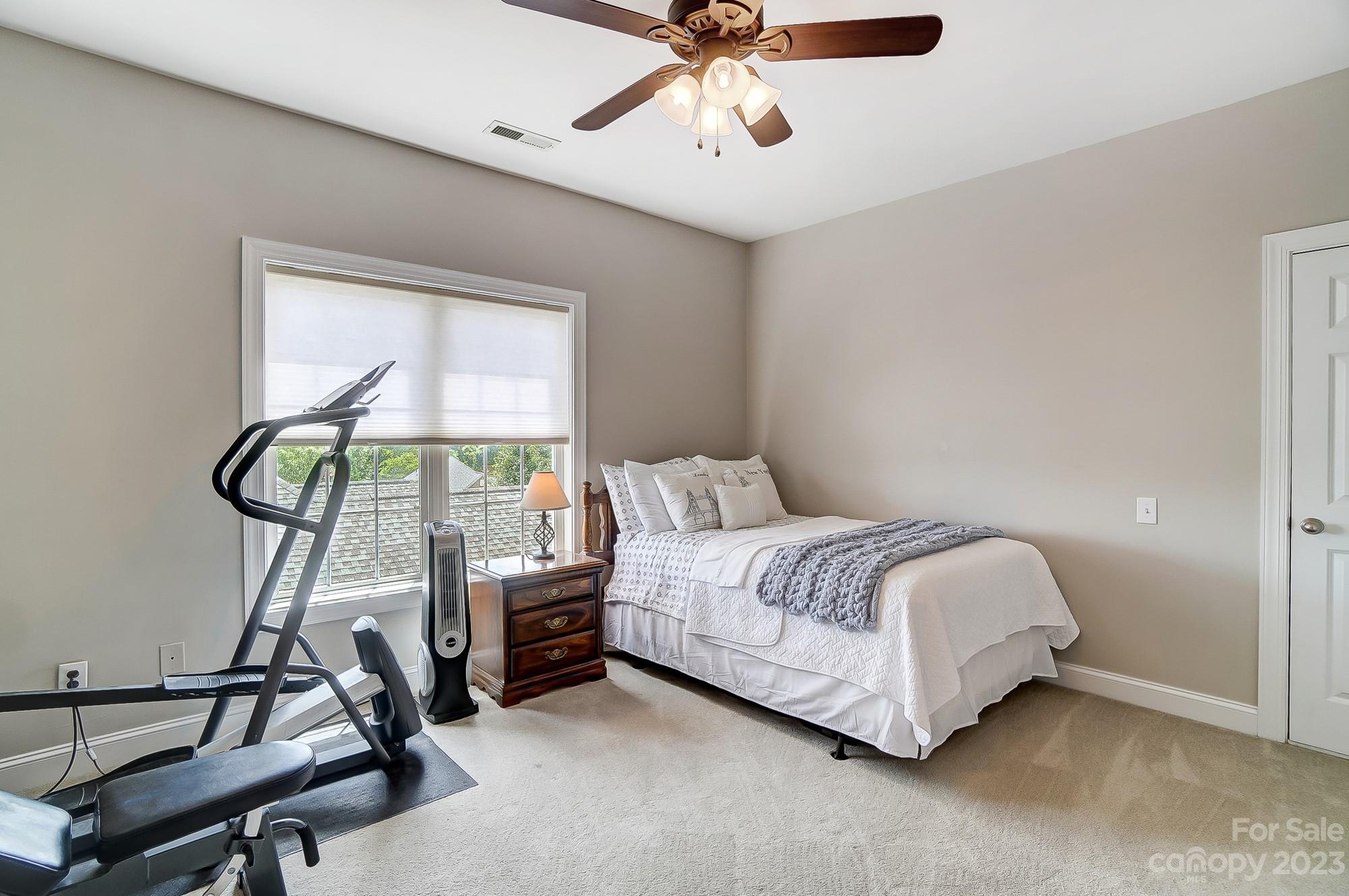 1105 Legacy Lane Fort Mill, SC 29708 - Photo 31 of 43 a bedroom with a bed and a window